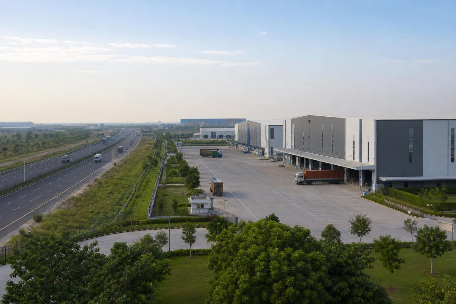 Modern logistics warehouses along the expressway