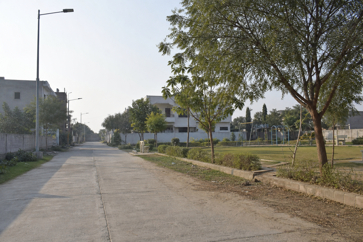 Internal street and neighborhood park at Radha Krishna Puram
